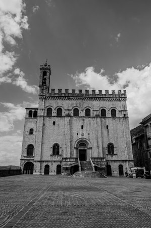 The Gothic-style Palazzo dei Consoli was built in the 14th century by the city government, which sought to demonstrate the city's grandeur and power. Since 1901, it has housed the civic museum.の写真素材