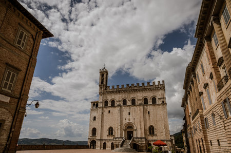 The Gothic-style Palazzo dei Consoli was built in the 14th century by the city government, which sought to demonstrate the city's grandeur and power. Since 1901, it has housed the civic museum.の写真素材