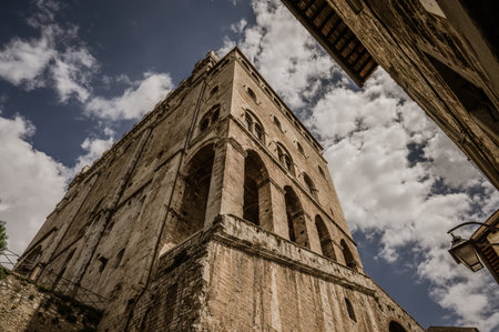 The Gothic-style Palazzo dei Consoli was built in the 14th century by the city government, which sought to demonstrate the city's grandeur and power. Since 1901, it has housed the civic museum.の写真素材