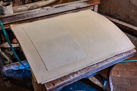 The museum preserves the centuries-old tradition of papermaking that makes Fabriano unique in Europe. Inside, it houses a faithful reproduction of the medieval hand-made paper filling mill.の写真素材