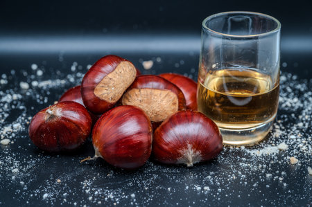 A composition of a typically autumnal fruit, such as the chestnut, which enhances its beauty and details.の写真素材