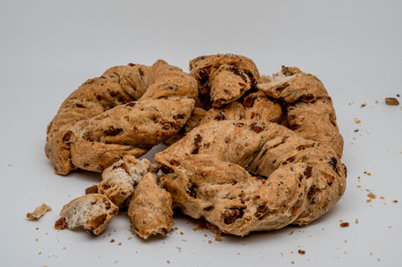 These taralli with lard and pepper are irresistible and also very simple to prepare. One bite, close...