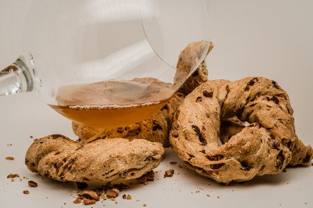 These taralli with lard and pepper are irresistible and also very simple to prepare. One bite, close your eyes and you'll feel like you're in Naples.の写真素材