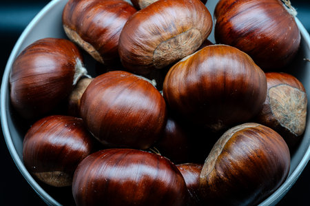 A composition of a typically autumnal fruit, such as the chestnut, which enhances its beauty and...
