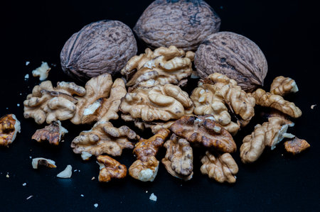 A composition of typically autumnal fruits such as walnuts, enhancing their beauty and detail.の写真素材