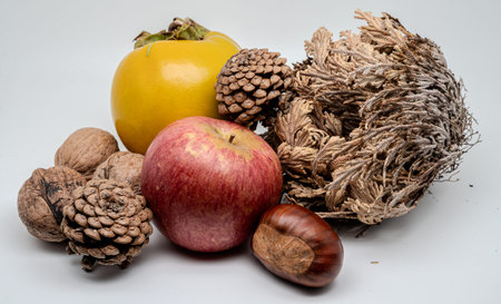 A composition of typically autumnal fruits such as chestnuts, walnuts, persimmons or the Campanian...