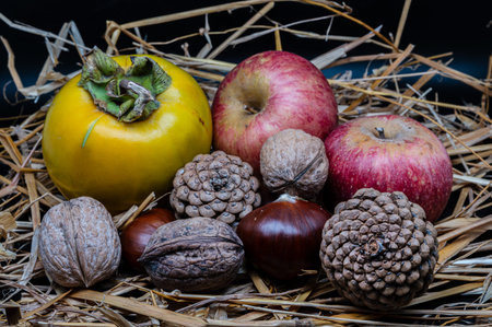 A composition of typically autumnal fruits such as chestnuts, walnuts, persimmons or the Campanian...