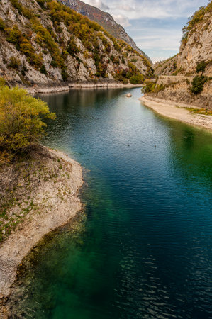 It is a spectacular canyon carved out over the millennia by the Sagittario River, within a protected area managed by the WWF, the Gole del Sagittario Regional Nature Reserve.の写真素材