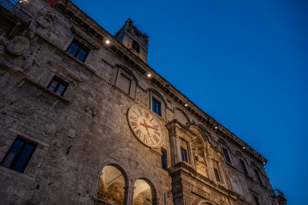 The Palazzo dei Capitani del Popolo is one of the best known historical buildings in Ascoli Piceno. With its medieval crenellated tower it rises next to the historic CaffÃ¨ Meletti.の写真素材