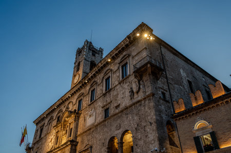 The Palazzo dei Capitani del Popolo is one of the best known historical buildings in Ascoli Piceno. With its medieval crenellated tower it rises next to the historic CaffÃ¨ Meletti.の写真素材