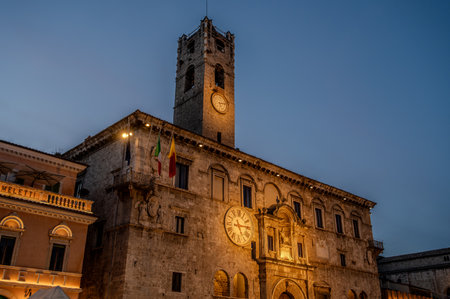 The Palazzo dei Capitani del Popolo is one of the best known historical buildings in Ascoli Piceno. With its medieval crenellated tower it rises next to the historic CaffÃ¨ Meletti.の写真素材