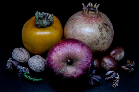 A composition of typically autumnal fruits such as chestnuts, walnuts, persimmons or the Campanian...