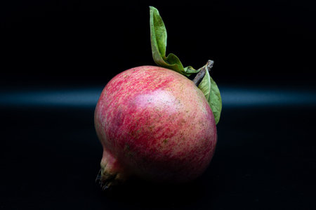 The pomegranate is the fruit of the pomegranate tree (Punica granatum), a spherical, deep red berry...