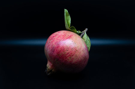 The pomegranate is the fruit of the pomegranate tree (Punica granatum), a spherical, deep red berry...