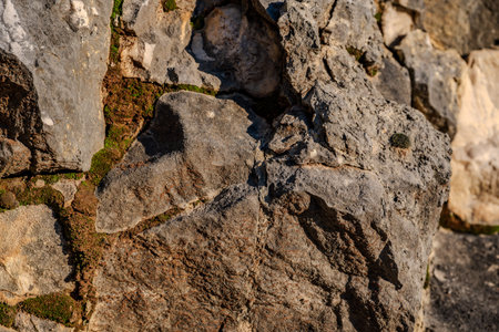 Limestone is a sedimentary rock whose main component is the mineral calcite. Limestone deposits are more or less interpenetrated by clay or quartzite impurities.の写真素材