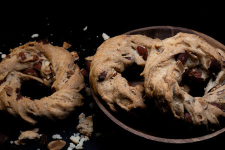 Taralli with lard and almonds, better known as taralli 'nzogna e pepe, are very crumbly thanks to...
