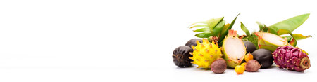 Assorted exotic tropical vegetables on white background isolate. Farm products for the store. Healthy food with vitamins. AI generated. Header banner mockup with space.の素材