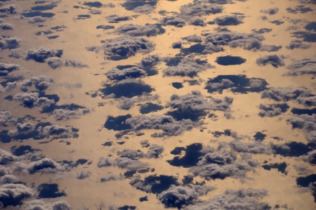 Close aerial view of the cumulus clouds over Red Sea in direct sunlightの写真素材