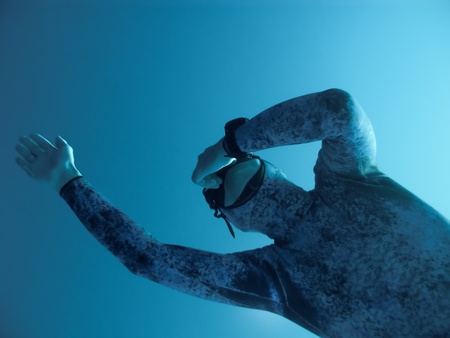 Close view of the freediver making deep dive in Blue Hole, Dahab, Egyptの写真素材