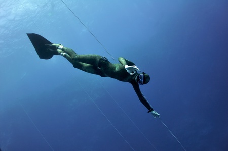 Freediver shows the "OK" sign in the depth of Blue Hole, Gyptの写真素材