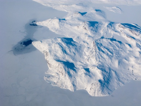 Aerial view of the Greenland with mountain, ocean and ice holesの写真素材
