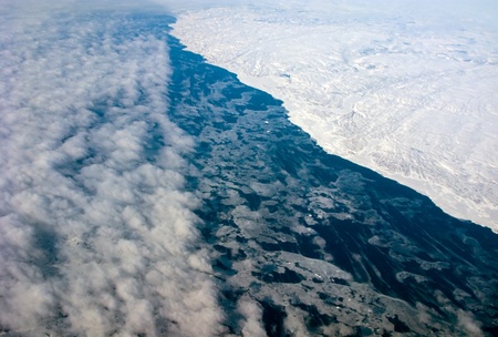 Aerial view of the Greenland cloudiness coastline with oceanの写真素材