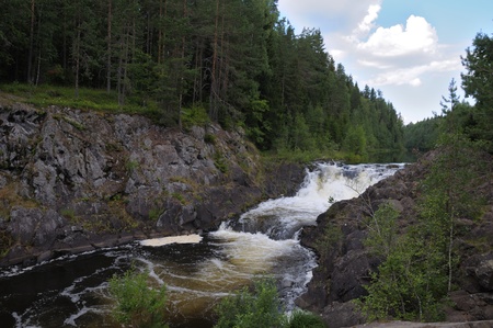 This picture shows Kivach - the most powerfull waterfall in Karelia region (approximately 12 meters)の写真素材