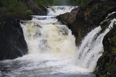 This picture shows Kivach - the most powerfull waterfall in Karelia region (approximately 12 meters)の写真素材