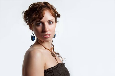 Pretty young woman looking toward the camera.の写真素材