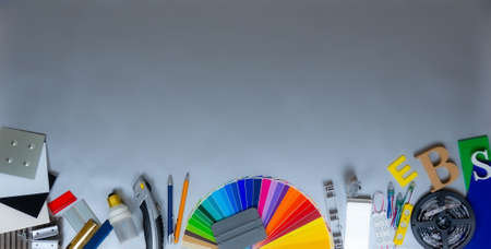 Advertising tools, construction materials and samples on plywood backgroundの写真素材