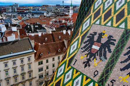 Austrian emblem on the roof of temple in Viennaの写真素材