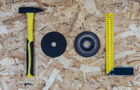 The word TOOL made up of letters collected from construction tools. Background of OSB building...