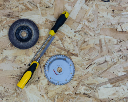 Percent symbol made up of construction tools. Background of OSB building board.の写真素材