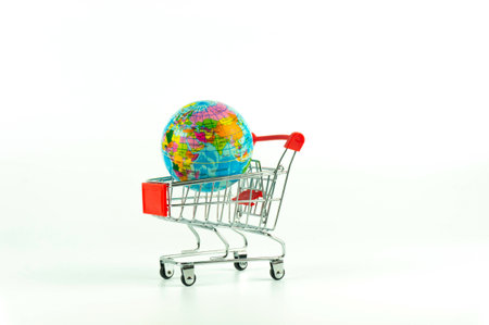 Planet Earth model in the shopping cart, Plain white bacground.の写真素材