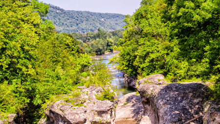 View of the mountain river and forest. Landscape. Outdoors. Russia. Adygea. Horizontal format. Color. Photo.の写真素材