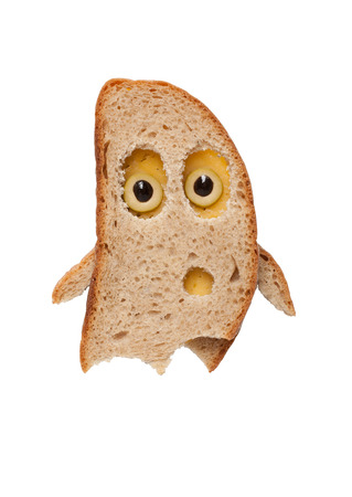 Halloween ghost made of bread on isolated backgroundの写真素材