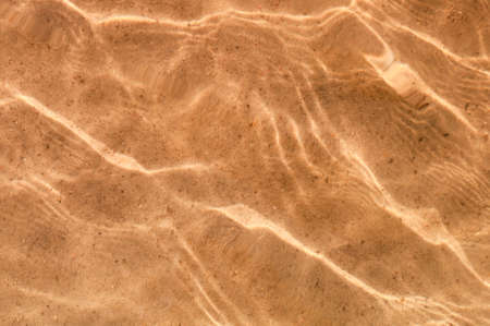 background of river sand under waterの写真素材