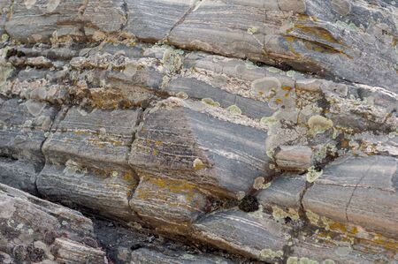 Background of an interesting layered stoneの写真素材