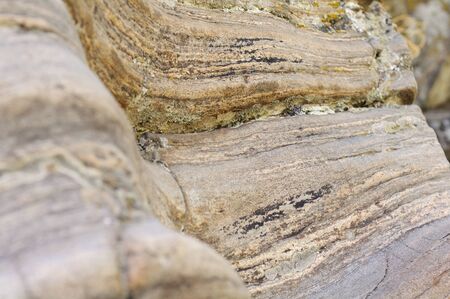 The background of an interesting layered river water stoneの写真素材