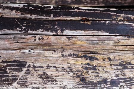 Textural background of old worn dark pine boards close upの写真素材