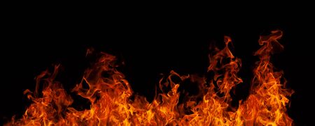 Colorful orange-red bright flame blazing fire. Burning fire on black background close-up. Horizontal background.の写真素材