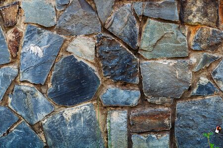 Background texture of old rough granite stonesの写真素材