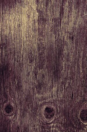 Background of old worn darkened from time to time, brown wooden plankの写真素材
