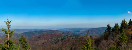 Bright fresh blue sky, autumn landscape with mountains and lake. Carpathians, Ukraine, Europe. View from high mountain on picturesque landscape.の写真素材