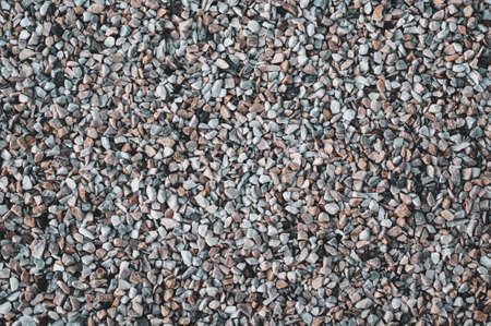 Small decorative stone, crumb for landscape design, beautiful background for stories on social networks. Vintage background close-upの写真素材