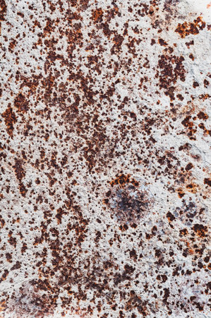 Rough textured surface very rusted iron, vintage background old rusty metal sheet close-up, red-brown rusty colorの写真素材