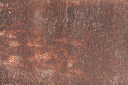 Grunge background, old metal sheet, weathered very rusted steel, red color metal, textured surface, outdoor material, close-up.の写真素材