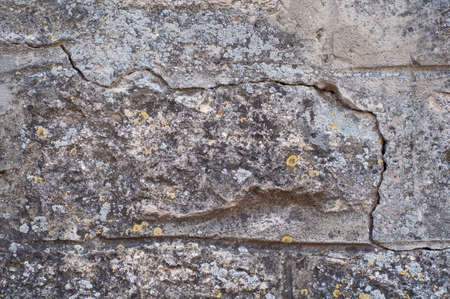 Antique wall background with peeling decorative plaster, vintage background rough textured surface, antique material.の写真素材