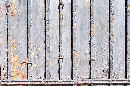 Old pine boards with peeling paint horizontal close-up photo, blank template for banner designの写真素材