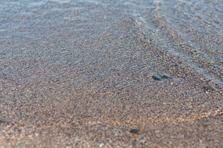 Background, top view, rapid flow river with dark blue water and white foam waves.の写真素材